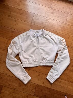 ALO cropped long sleeve zip up jacket in off white
